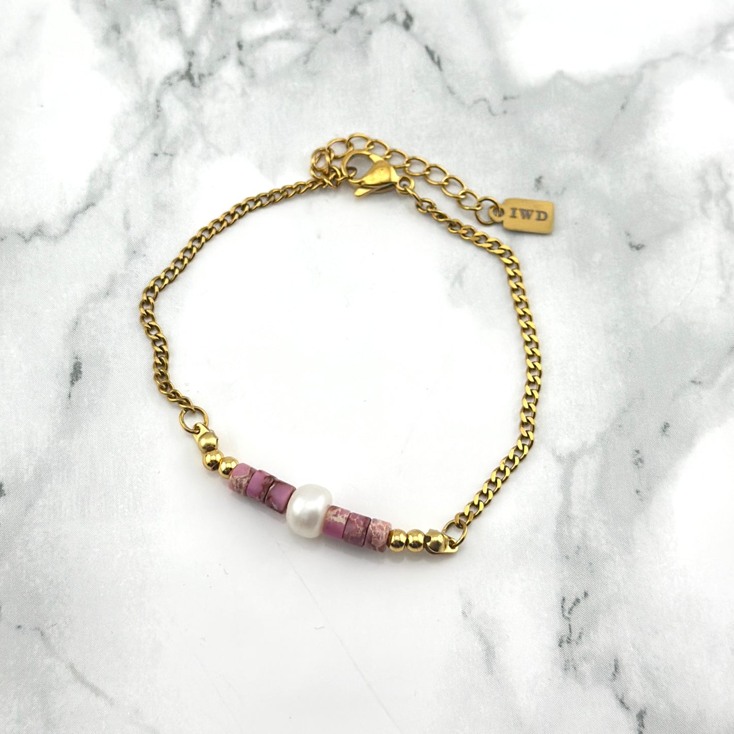 Gouden armband met roze Beads
