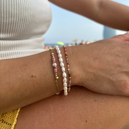 Gouden armband met roze Beads